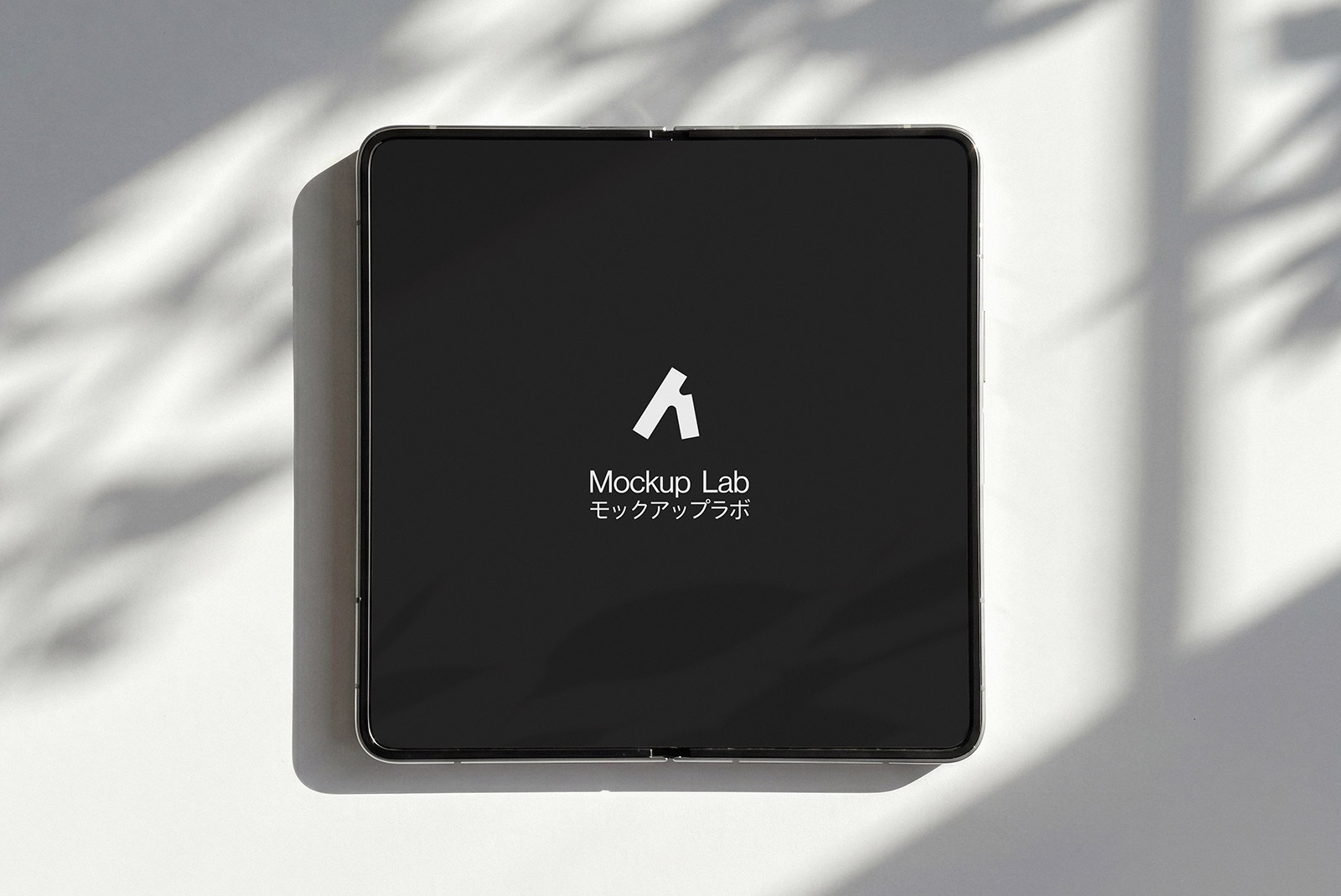 Angled view of the fold phone mockup, highlighting screen details and device form.